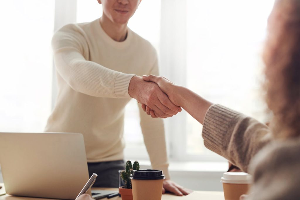 Business broker reviewing listing information before publishing
